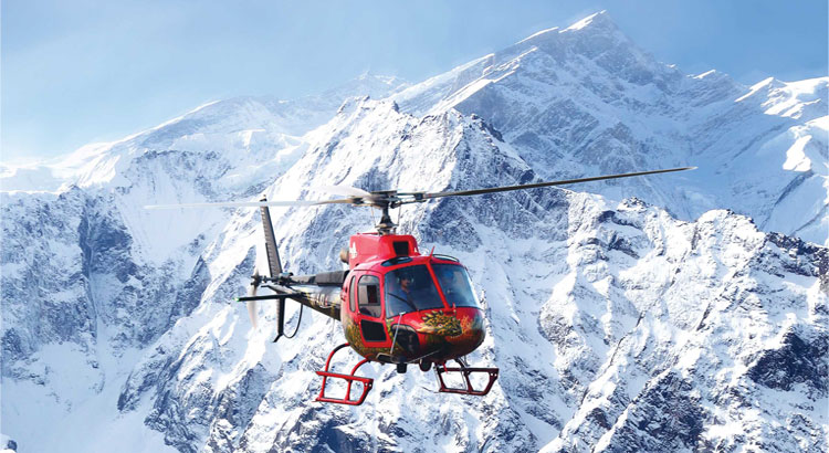 Helicopter flying over the stunning Himalayan peaks during the Everest Helicopter Tour, offering breathtaking views of Mount Everest, glaciers, and surrounding landscapes.