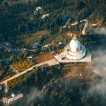 This is a beautiful picture of the World Peace Pagoda situated in Pokhara, Nepal. It symbolizes the beauty of Nepal's Buddhist religion.