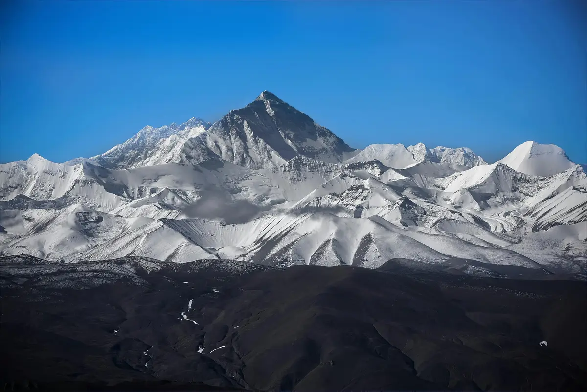 "Stunning view of snow-covered Himalayan peaks during trekking in Nepal after COVID, showcasing the serene and uncrowded trails of the post-pandemic era."