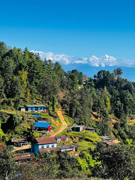An old village of Chapakharka that falls on way during Lakuri Bhanjyang to Chapakharka Hike with beautiful Ganesh Himal Range in background.